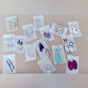 Different brands of earrings, most are brand new, ive kept them in plastic bags